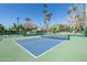 Community pickleball court with palm trees and landscaping at 2057 E Marquette Dr, Gilbert, AZ 85234