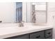 Modern bathroom vanity with gray cabinets and white countertop at 2057 E Marquette Dr, Gilbert, AZ 85234