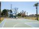 Outdoor basketball court with playground nearby at 2057 E Marquette Dr, Gilbert, AZ 85234