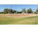 Community baseball field with benches and backstop at 2057 E Marquette Dr, Gilbert, AZ 85234