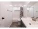 Clean bathroom, featuring a shower/tub combo and gray vanity at 2057 E Marquette Dr, Gilbert, AZ 85234