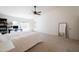 Bright bedroom with large window, plush carpeting, and built-in workspace at 2057 E Marquette Dr, Gilbert, AZ 85234