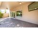 Covered patio with window and sliding glass doors at 2057 E Marquette Dr, Gilbert, AZ 85234