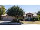 Single story home with a two-car garage at 2057 E Marquette Dr, Gilbert, AZ 85234