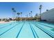 Resort-style swimming pool with cabanas and lounge chairs at 2057 E Marquette Dr, Gilbert, AZ 85234