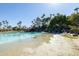 Relaxing resort-style pool with sandy beach entry at 2057 E Marquette Dr, Gilbert, AZ 85234