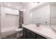 Updated bathroom with subway tile and gray vanity at 2057 E Marquette Dr, Gilbert, AZ 85234