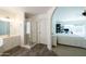 Bathroom with shower, vanity, and view into bedroom at 2057 E Marquette Dr, Gilbert, AZ 85234