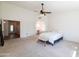 Spacious main bedroom with access to a walk-in closet and bathroom at 2057 E Marquette Dr, Gilbert, AZ 85234
