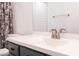 Bathroom vanity with gray cabinets and white countertop at 2057 E Marquette Dr, Gilbert, AZ 85234