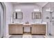 Elegant bathroom with dual vanities and a walk-in shower at 6802 E Paradise Pkwy, Scottsdale, AZ 85251