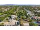 Aerial view of a luxury home and surrounding neighborhood at 3011 E Morrison Ranch Pkwy, Gilbert, AZ 85296