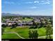 Expansive aerial view showcasing homes and golf course at 12028 N 80Th Pl, Scottsdale, AZ 85260