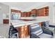 Modern kitchen with a large island and breakfast bar at 12028 N 80Th Pl, Scottsdale, AZ 85260