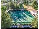 Community tennis courts with ample space and surrounding greenery at 12028 N 80Th Pl, Scottsdale, AZ 85260