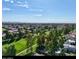 Wide aerial view of community, golf course and distant mountains at 12028 N 80Th Pl, Scottsdale, AZ 85260