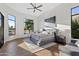 Main bedroom with hardwood floors and large windows at 12028 N 80Th Pl, Scottsdale, AZ 85260