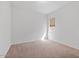 Spacious bedroom with carpeted floor and a window at 11856 W Lone Tree Trl, Peoria, AZ 85383