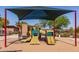 Covered playground with slides and play structures at 11856 W Lone Tree Trl, Peoria, AZ 85383