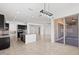 Open concept kitchen with island and Gathering room view at 11856 W Lone Tree Trl, Peoria, AZ 85383