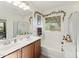 Bathroom boasts double sinks, soaking tub, and shower at 723 E Gold Dust Way, San Tan Valley, AZ 85143