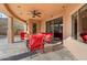 Outdoor patio with seating area, fire pit, and access to the interior at 2477 E Glenhaven Dr, Phoenix, AZ 85048