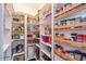 Well-organized pantry with ample shelving at 2477 E Glenhaven Dr, Phoenix, AZ 85048