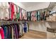 Large walk-in closet with ample hanging space at 726 E Citrus Hollow Way, Queen Creek, AZ 85140