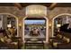 Elegant lobby with high ceilings, stone walls, and comfortable seating at 726 E Citrus Hollow Way, Queen Creek, AZ 85140