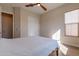 Bedroom with wood floor and ceiling fan at 726 E Citrus Hollow Way, Queen Creek, AZ 85140