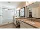 Elegant bathroom with dual vanity and walk-in shower at 726 E Citrus Hollow Way, Queen Creek, AZ 85140