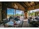 Outdoor patio seating with views of a golf course at 726 E Citrus Hollow Way, Queen Creek, AZ 85140