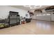 Spacious garage with overhead storage and epoxy flooring at 726 E Citrus Hollow Way, Queen Creek, AZ 85140