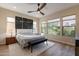 Spacious bedroom with large windows and wood-look floors at 726 E Citrus Hollow Way, Queen Creek, AZ 85140