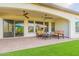 Covered patio with brick pavers and seating at 726 E Citrus Hollow Way, Queen Creek, AZ 85140