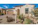 One-story home with a two-car garage and landscaped yard at 726 E Citrus Hollow Way, Queen Creek, AZ 85140