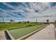 Two bocce ball courts with green surfaces at 726 E Citrus Hollow Way, Queen Creek, AZ 85140