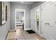 Bright entryway with view to bedroom and exterior door at 7700 E Gainey Ranch Rd # 206, Scottsdale, AZ 85258