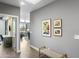 Clean and modern hallway with access to living area at 7700 E Gainey Ranch Rd # 206, Scottsdale, AZ 85258