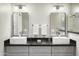 Modern bathroom with double vanity and sleek countertops at 7700 E Gainey Ranch Rd # 206, Scottsdale, AZ 85258