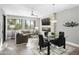 Spacious living room with stone fireplace and comfortable seating at 7700 E Gainey Ranch Rd # 206, Scottsdale, AZ 85258