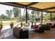 Relaxing community patio with comfortable seating and landscaping at 7700 E Gainey Ranch Rd # 206, Scottsdale, AZ 85258