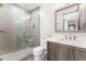 Modern bathroom with glass shower and updated vanity at 36931 N 102Nd Pl, Scottsdale, AZ 85262