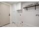 Well-appointed laundry room with ample storage at 13944 N 88Th Pl, Scottsdale, AZ 85260