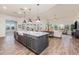 Open concept kitchen with island, looking toward living room at 17427 E Desert Vista Trl, Rio Verde, AZ 85263