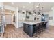 Spacious kitchen island with seating and granite countertops at 17427 E Desert Vista Trl, Rio Verde, AZ 85263