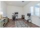 Functional home office featuring a desk, ample storage, and a large window at 17427 E Desert Vista Trl, Rio Verde, AZ 85263