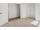Spacious bedroom with neutral carpeting and double door closet at 2268 S 162Nd Ln, Goodyear, AZ 85338