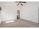 Well-lit bedroom with vaulted ceilings and carpet flooring at 2268 S 162Nd Ln, Goodyear, AZ 85338