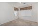 Bright bedroom with window coverings and ceiling fan at 2268 S 162Nd Ln, Goodyear, AZ 85338